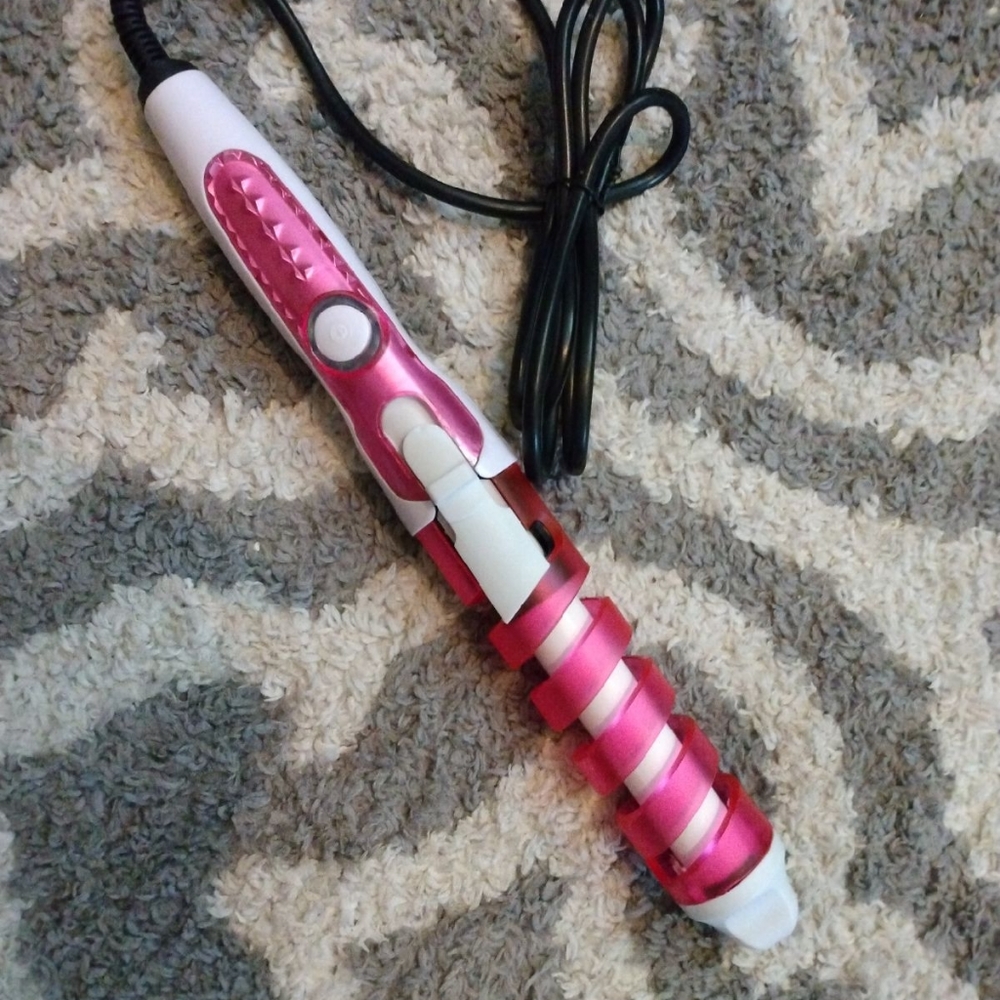 Pink curling iron